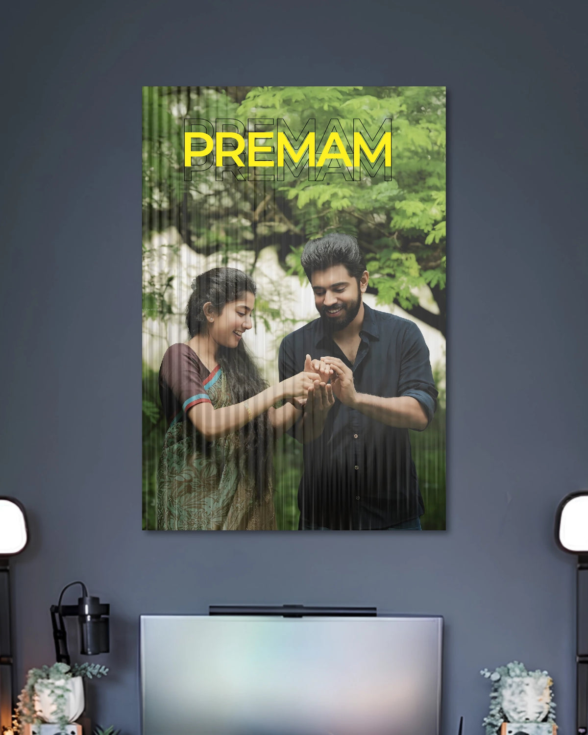 Premam Nivin Pauly Romantic Movie Poster poster design: Nivin Pauly and his co-star share a tender moment beneath a canopy of green trees in this Premam inspired poster. The natural setting and warm composition capture the film's romantic mood.