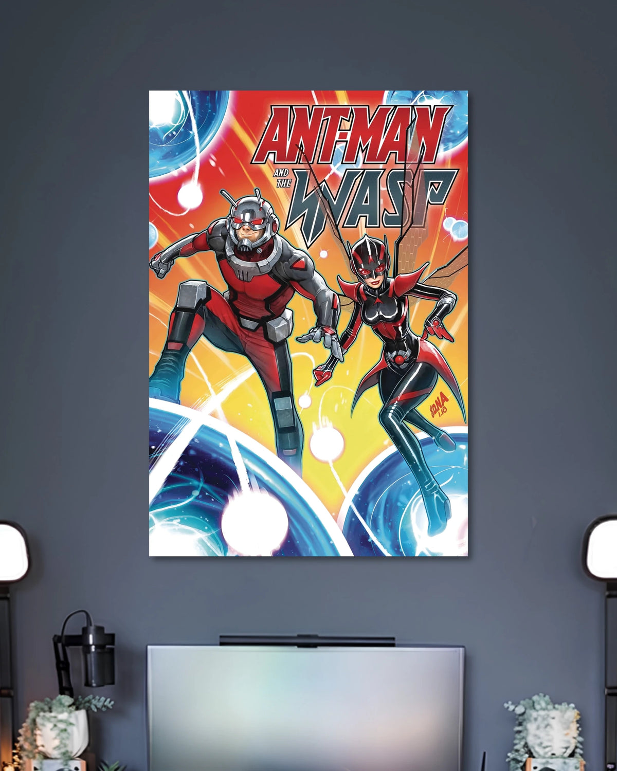 Comic illustration of Ant-Man and the Wasp flying through blue glowing rings beneath ANT-MAN AND THE WASP lettering.