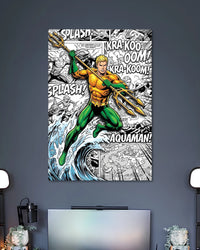 Aquaman in an orange top and green trousers holding a golden trident above a crashing wave with comic sound-effect lettering.