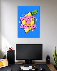 Don't Be Bitter Lemon Typography Poster poster design: A cheerful yellow lemon sits behind chunky pink lettering that reads “Don't Be Bitter.” The bright blue background and playful cartoon style make the design pop. Perfect for adding humour, colour, and a positive vibe to your room.