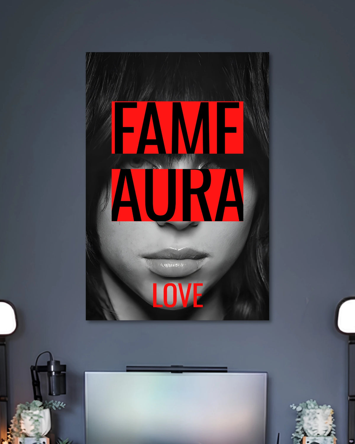 Black-and-white close-up of a woman's face partly hidden by large red FAME AURA text with LOVE underneath.