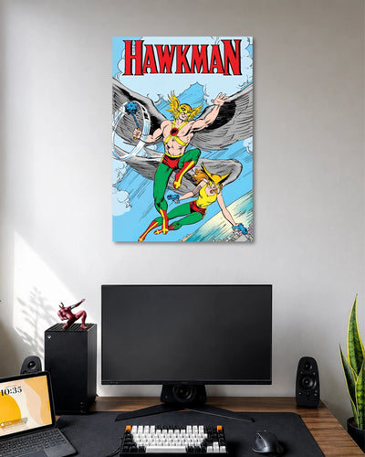 Vintage comic poster showing Hawkman with large gray wings, yellow headgear and a flying figure below against blue skies.
