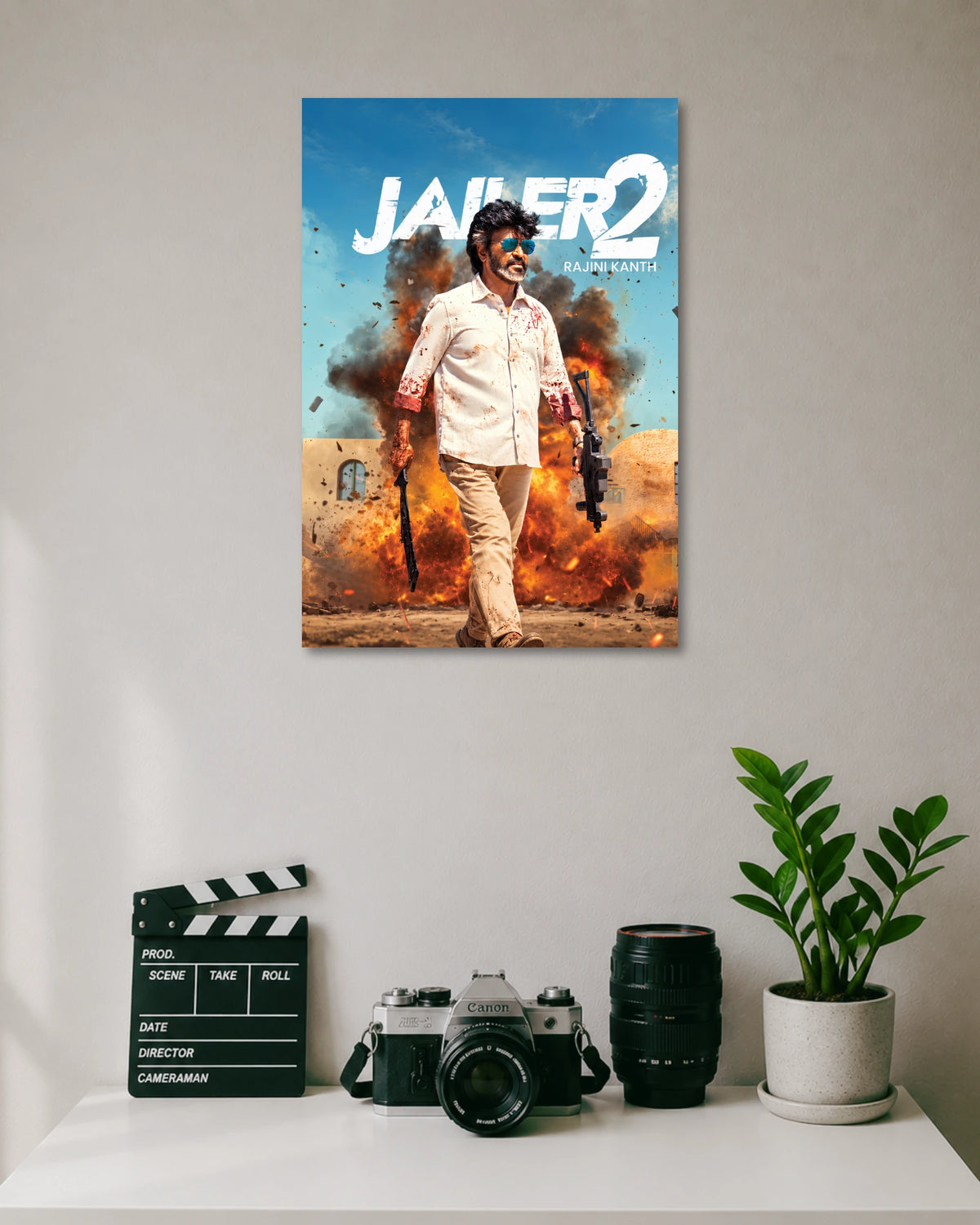 Jailer 2 Rajinikanth Action Movie Poster poster design: Rajinikanth strides through smoke, flames, and flying debris in this dramatic Jailer 2 poster. His white outfit, blue sunglasses, and bold movie title create an action packed design for fans of the superstar.