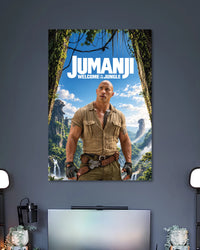 Jumanji Welcome to the Jungle Poster poster design: Bring the adventure of Jumanji to your walls with this poster featuring Dwayne Johnson in a rugged explorer outfit. The lush jungle, waterfalls and bright blue sky create an adventurous look for movie fans and entertainment spaces.