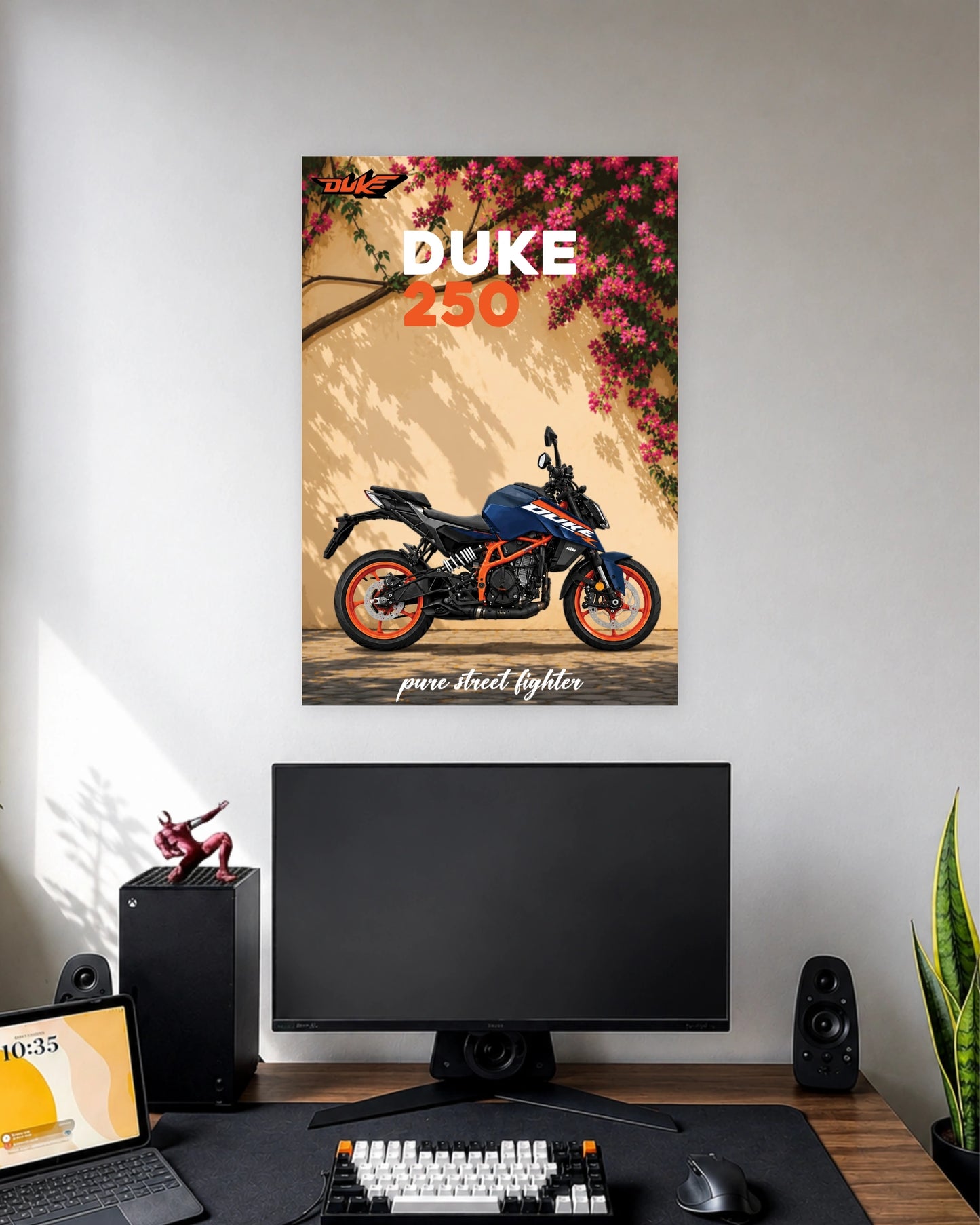 KTM Duke 250 Streetfighter Poster wall poster displayed in a modern minimalist workspace setup 1