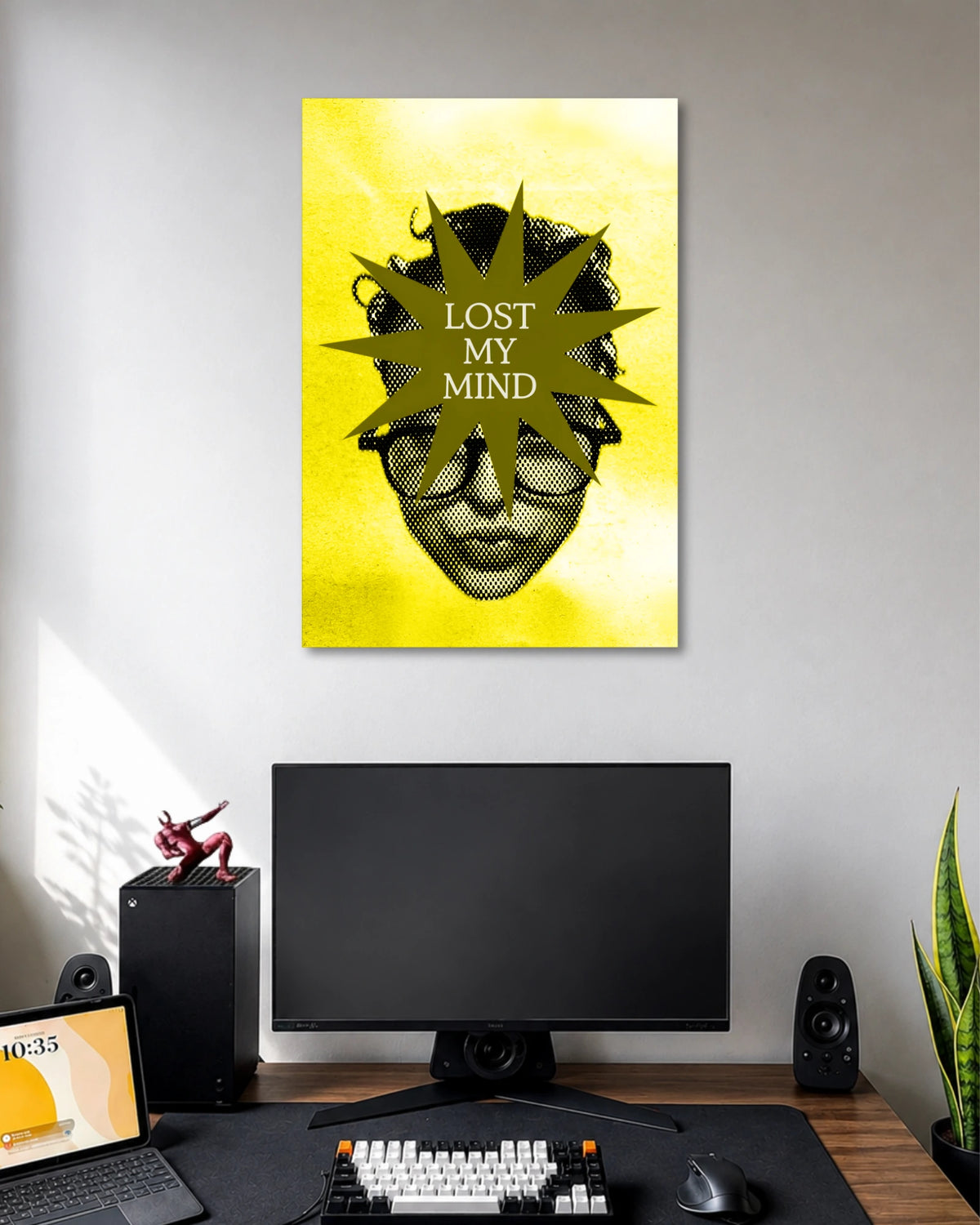 Bright yellow halftone poster with a grayscale face in glasses partly covered by an olive starburst reading LOST MY MIND.