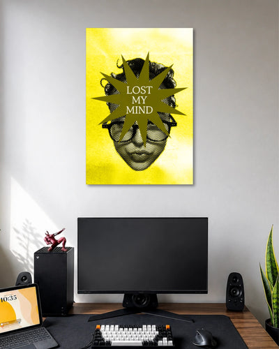 Bright yellow halftone poster with a grayscale face in glasses partly covered by an olive starburst reading LOST MY MIND.