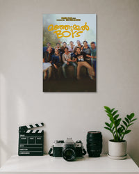 Manjummel Boys Movie Poster poster design: This Manjummel Boys poster brings the film's group of friends together in a cheerful ensemble portrait. The golden Malayalam title stands out against the soft natural background, while the darker lower section adds cinematic depth. A fitting choice for fans of the film.