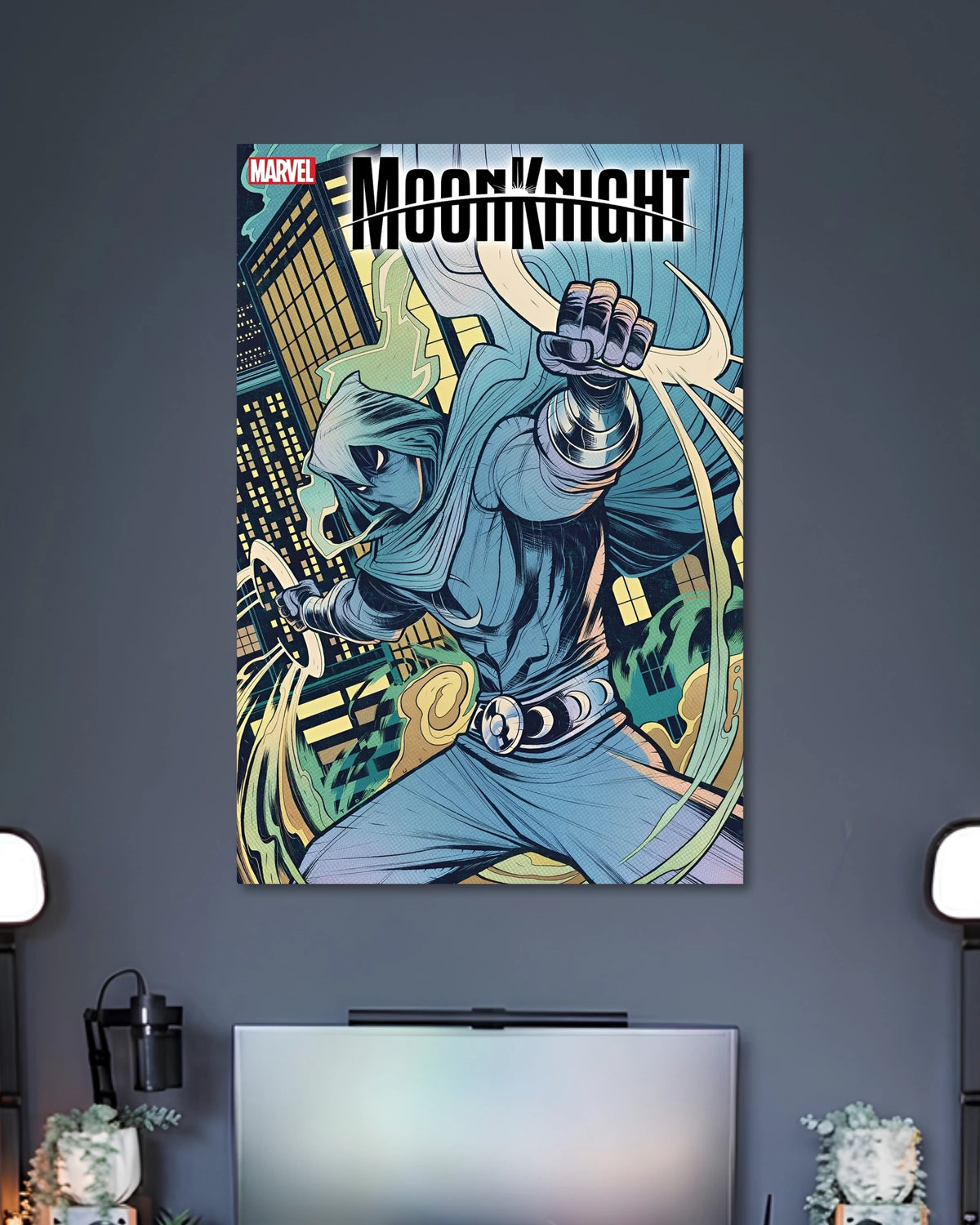 Blue-toned comic illustration of hooded Moon Knight jumping forward with white cape and crescent-themed weapons over a night city.