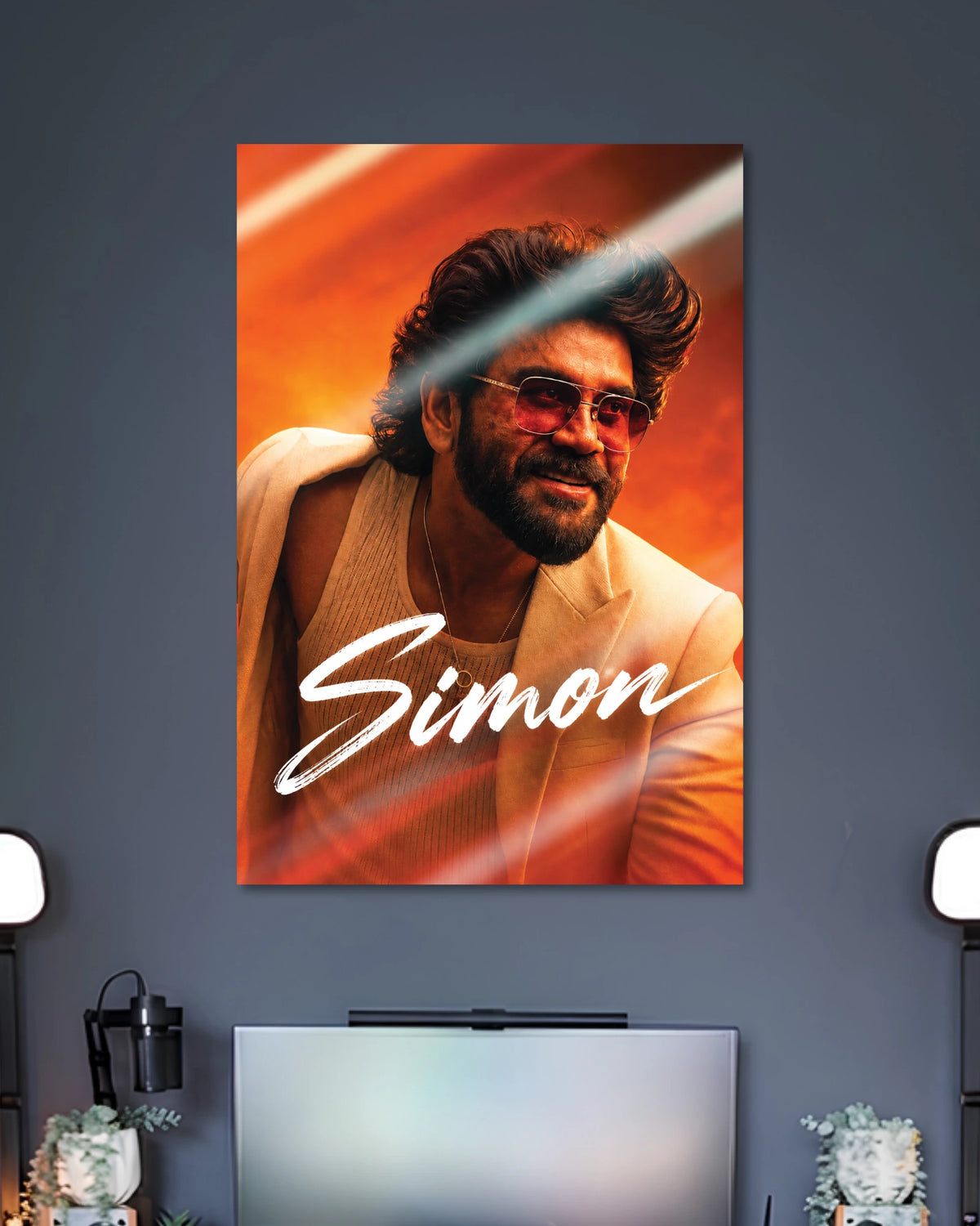 Simon Kuberaa Movie Poster poster design: Add a cinematic touch to your space with this Simon poster, featuring a bearded man in tinted glasses and a cream outfit. The warm orange background and bold script create a striking portrait design for movie fans and entertainment spaces.