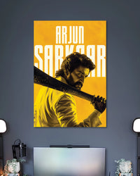 Nani Arjun Sarkaar HIT 3 Poster poster design: Celebrate Nani’s intense role as Arjun Sarkaar with this HIT: The Third Case poster. The striking yellow background, rugged look and sword resting across his shoulder create a bold action inspired design for Telugu cinema fans and movie themed spaces.