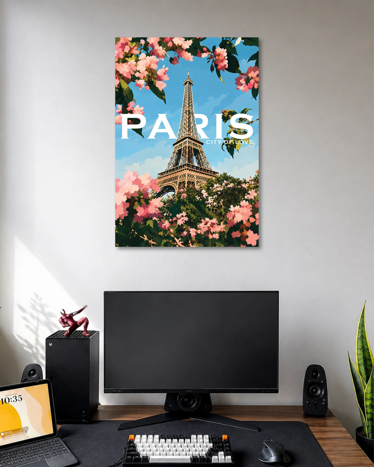 Paris Eiffel Tower Blossom Poster poster design: Celebrate the romance of Paris with this colourful travel poster featuring the Eiffel Tower framed by pink blossoms and leafy branches. The bright blue sky and painterly style create a fresh, cheerful look for travel lovers and modern interiors.