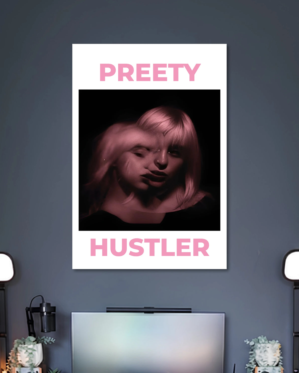 White poster with a dark close-up portrait of a woman tinted pink between PRETTY and HUSTLER lettering.