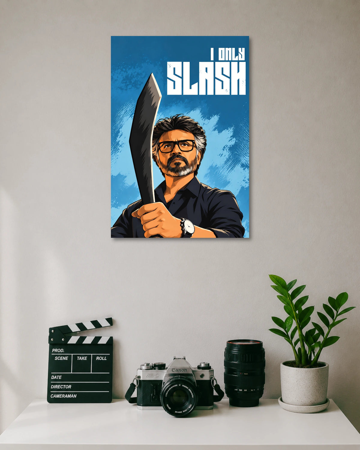 Rajinikanth I Only Slash Jailer Movie Poster poster design: Rajinikanth holds a large blade in front of a textured blue background, wearing a dark shirt and glasses. The oversized white lettering “I Only Slash” adds a dramatic graphic element to this illustrated Superstar poster.