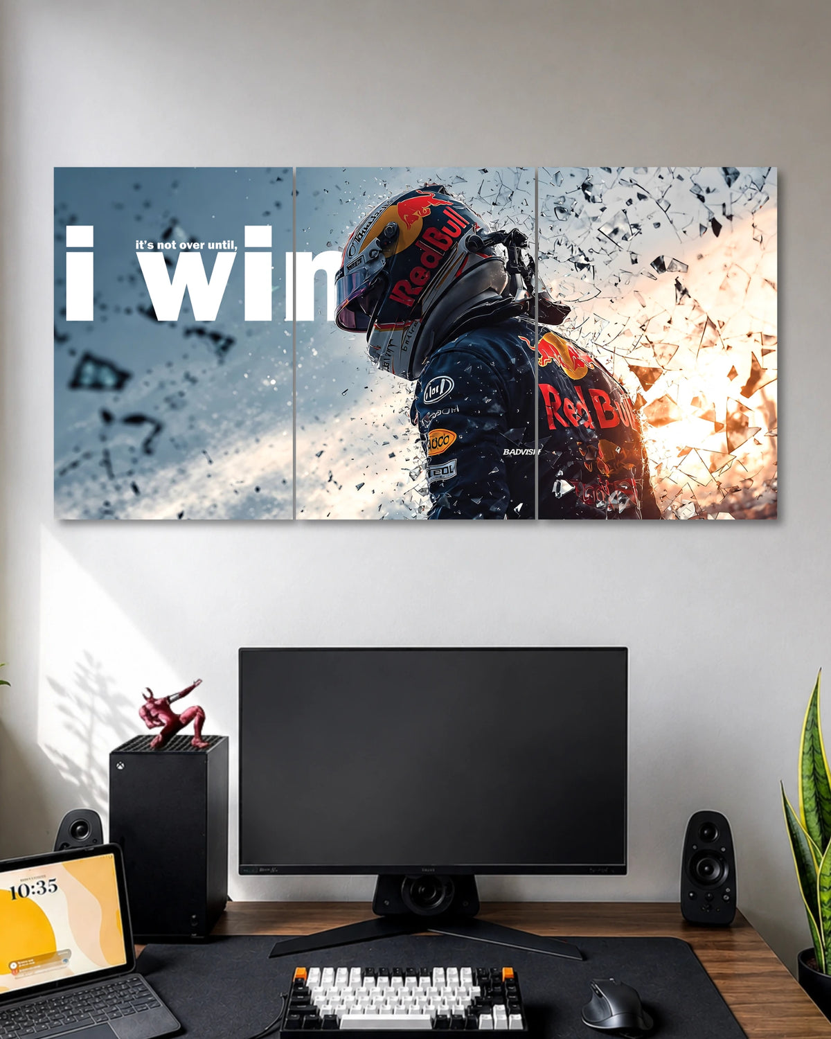 Three-panel Red Bull racing poster featuring a helmeted driver, large white I Win typography and shattered-glass effects against blue and orange lighting.