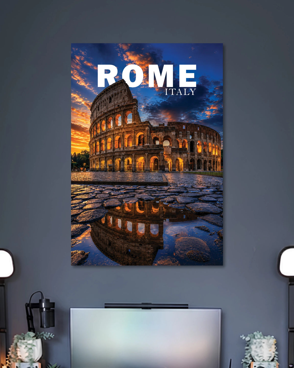 Rome Colosseum Sunset Travel Poster poster design: The Colosseum glows beneath a dramatic sunset sky, with warm golden lights reflected across wet cobblestones. This Rome travel poster captures the timeless beauty of Italy’s iconic landmark in a rich, atmospheric setting.