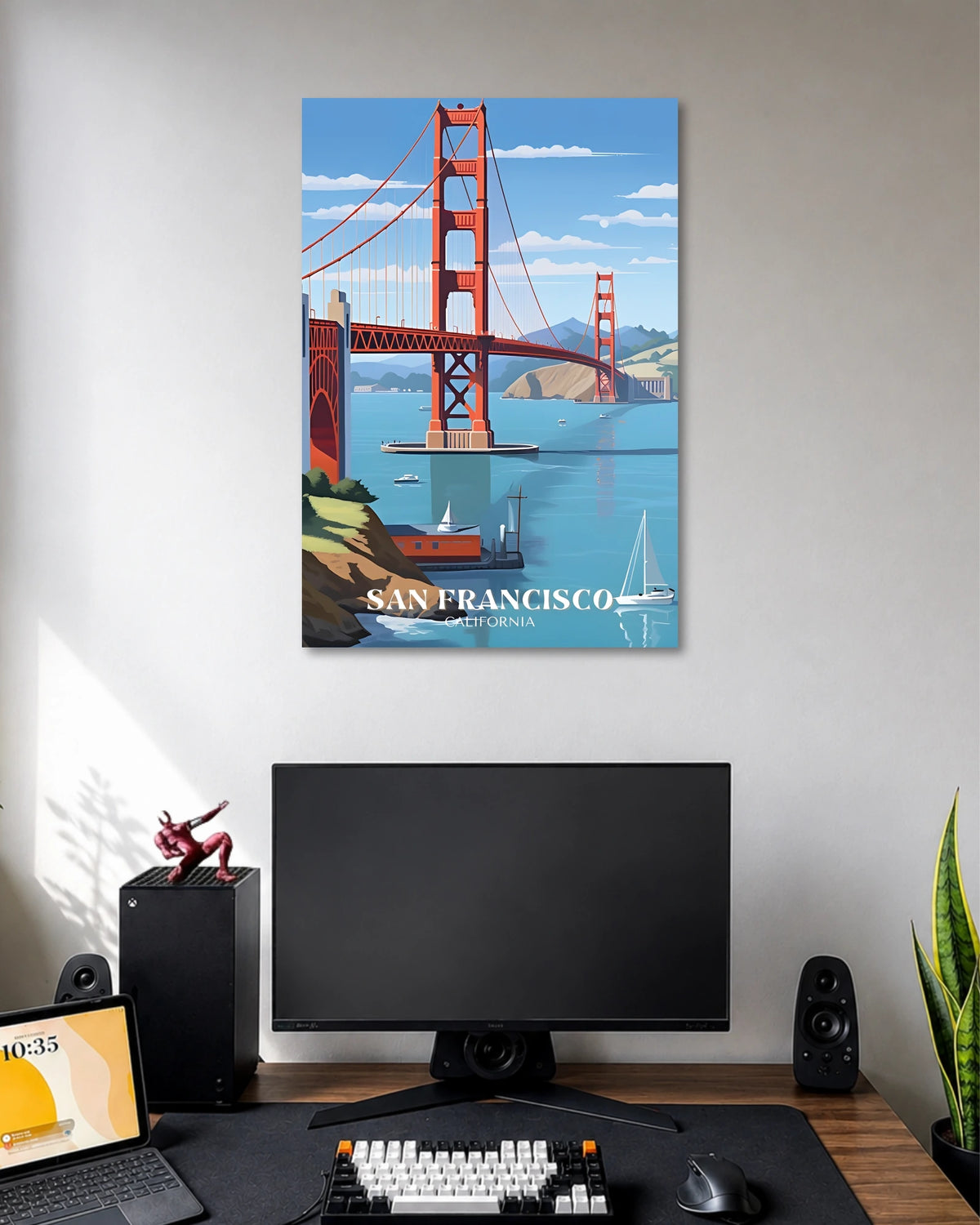 San Francisco Golden Gate Bridge Travel Poster poster design: The iconic Golden Gate Bridge rises above blue waters, with sailboats and distant hills completing the scene. The words “San Francisco, California” give this colourful travel illustration a classic city poster look.