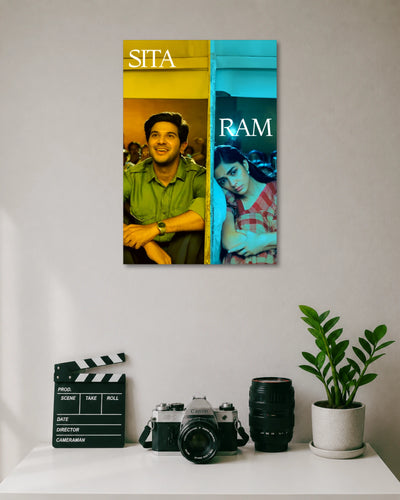 Sita Ramam Movie Couple Poster poster design: Sita and Ram appear in contrasting yellow and teal tones, capturing the romantic charm of Sita Ramam. The colourful artwork brings together the film’s beloved characters and a striking visual style, perfect for fans of romantic cinema.