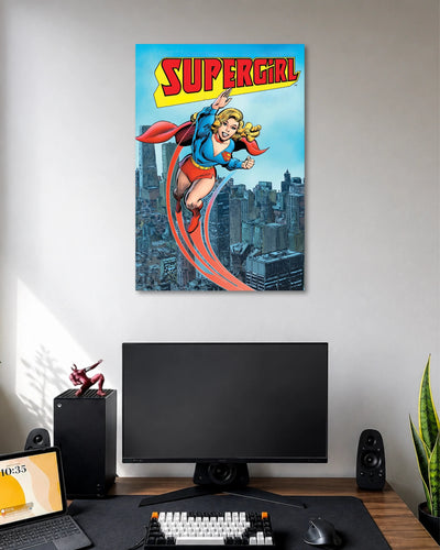 Vintage comic illustration of blonde Supergirl flying in a blue suit with a red cape above a city skyline.