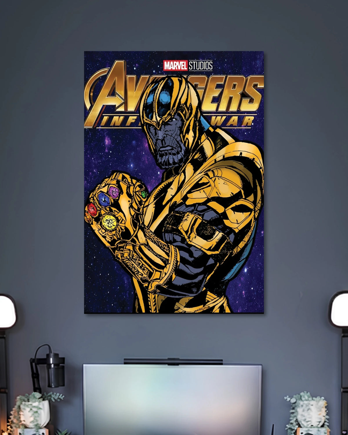 Comic illustration of Thanos in gold armor holding the gem-studded Infinity Gauntlet in front of a purple cosmic background.