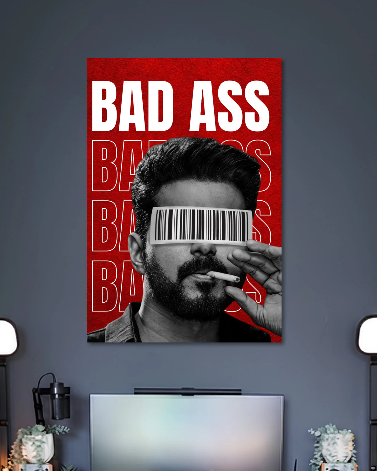 Vijay Badass Leo Poster poster design: Bring the intense style of Leo to your wall with this Vijay poster. The black and white portrait features Vijay with a barcode across his eyes, a cigarette and bold red “Bad Ass” typography, making it a striking choice for fans of the film.