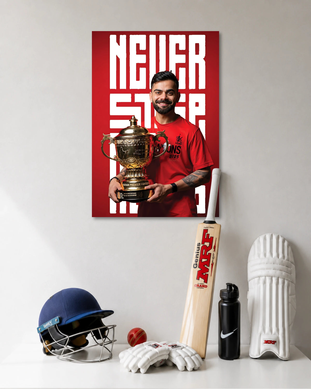 Virat Kohli RCB Trophy Poster poster design: Celebrate Virat Kohli with this RCB poster featuring him holding the IPL trophy in his red jersey. The striking red background and “Never Stop” typography make it a standout addition to a cricket fan's room.