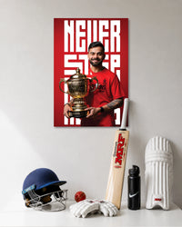 Virat Kohli RCB Trophy Poster poster design: Celebrate Virat Kohli with this RCB poster featuring him holding the IPL trophy in his red jersey. The striking red background and “Never Stop” typography make it a standout addition to a cricket fan's room.