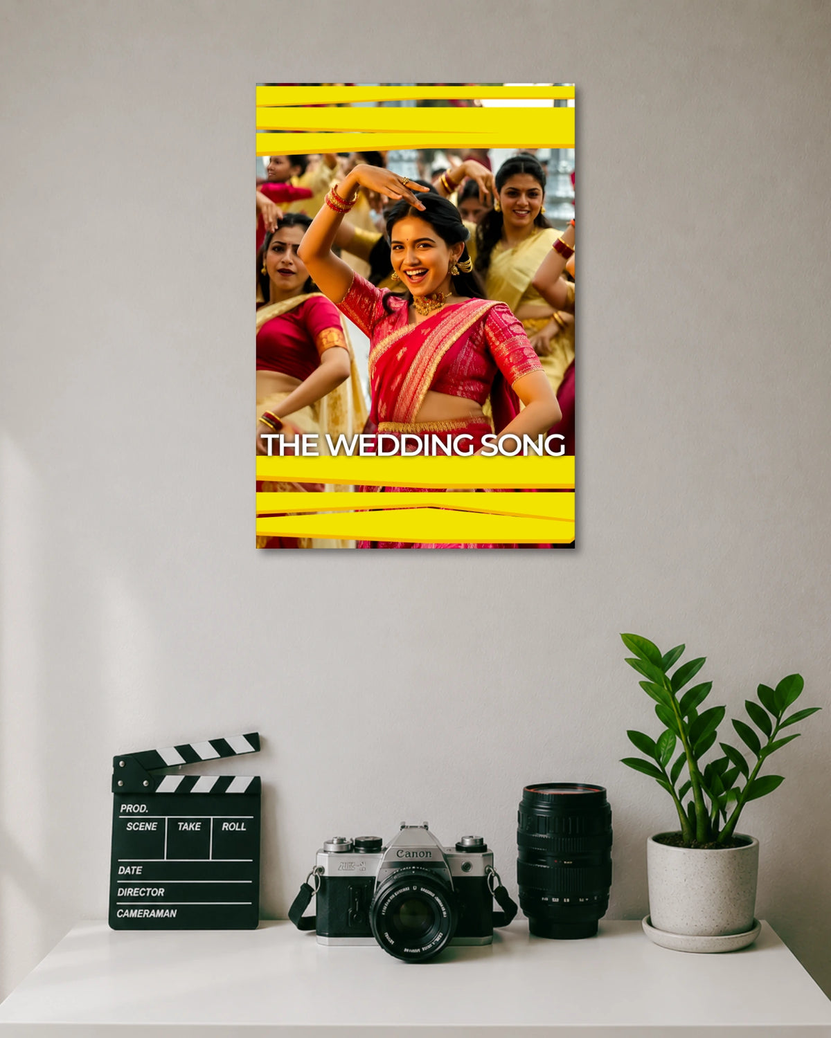 Vishwanathan and Sons Wedding Song Poster poster design: This Vishwanathan and Sons poster captures a vibrant wedding dance scene, with a woman in a pink saree at the centre and other dancers in traditional attire behind her. Bright yellow graphic bands and clean white lettering add a lively cinematic finish.